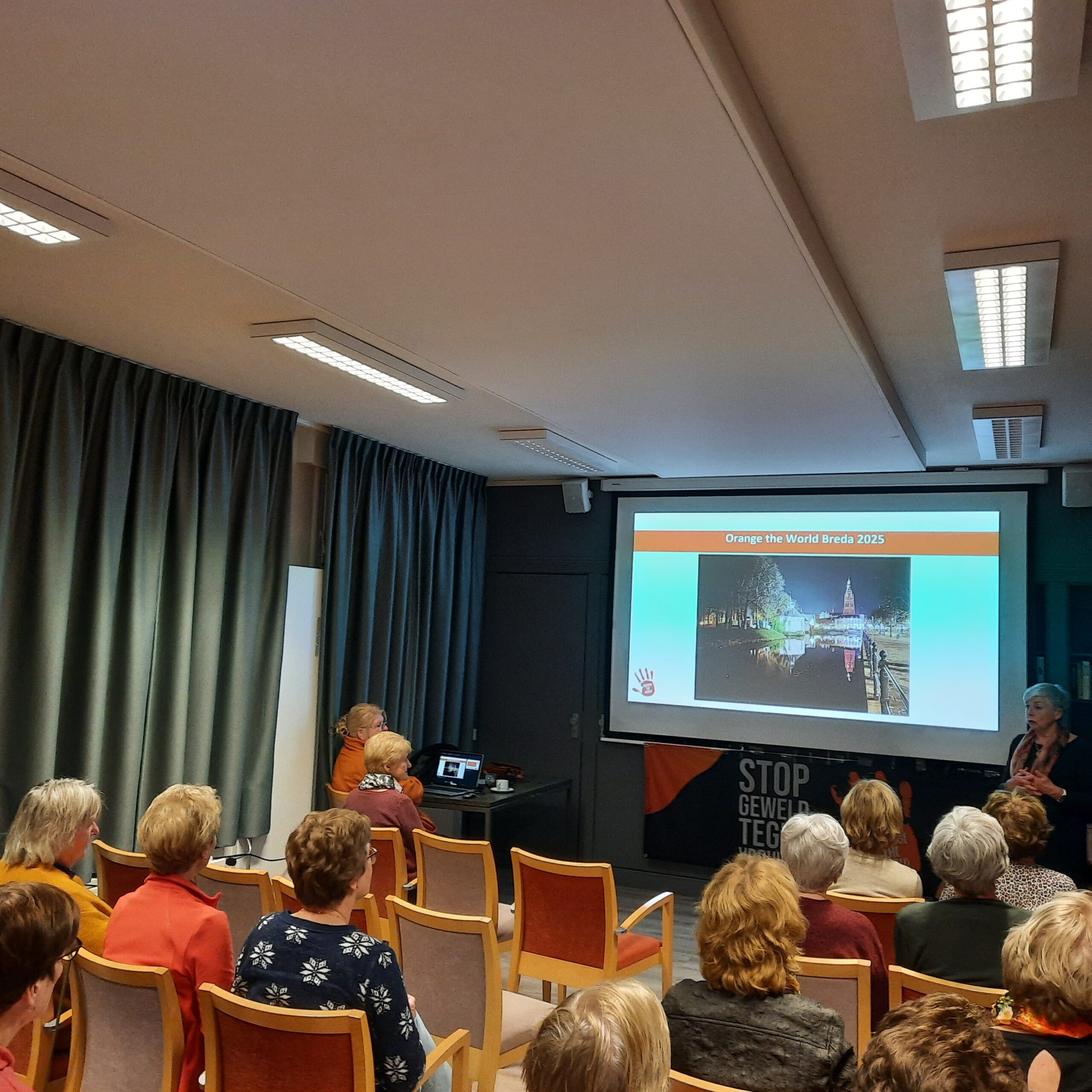 Lezing Orange the World 2-12-2025
